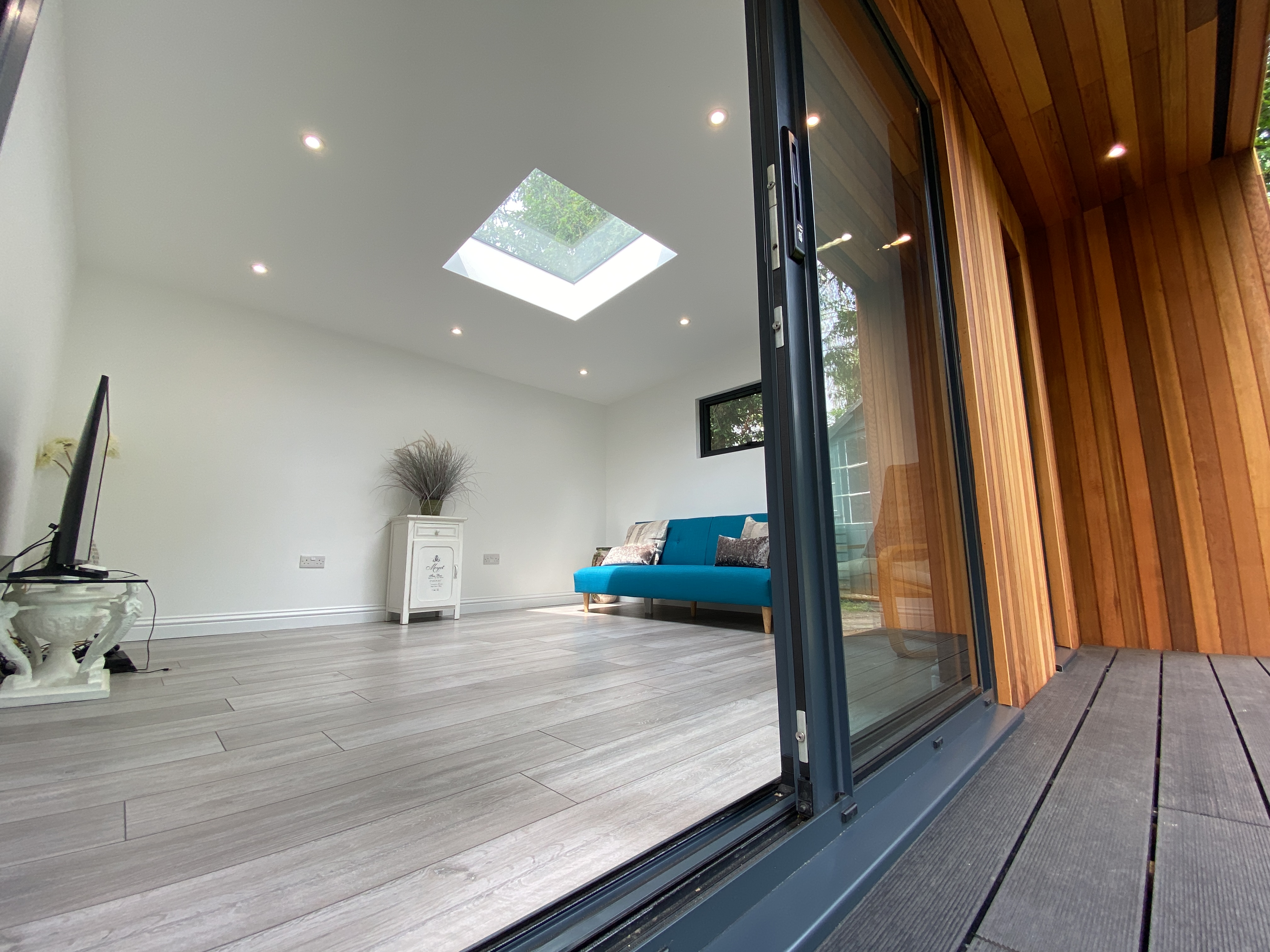 garden room with log store walton on the hill