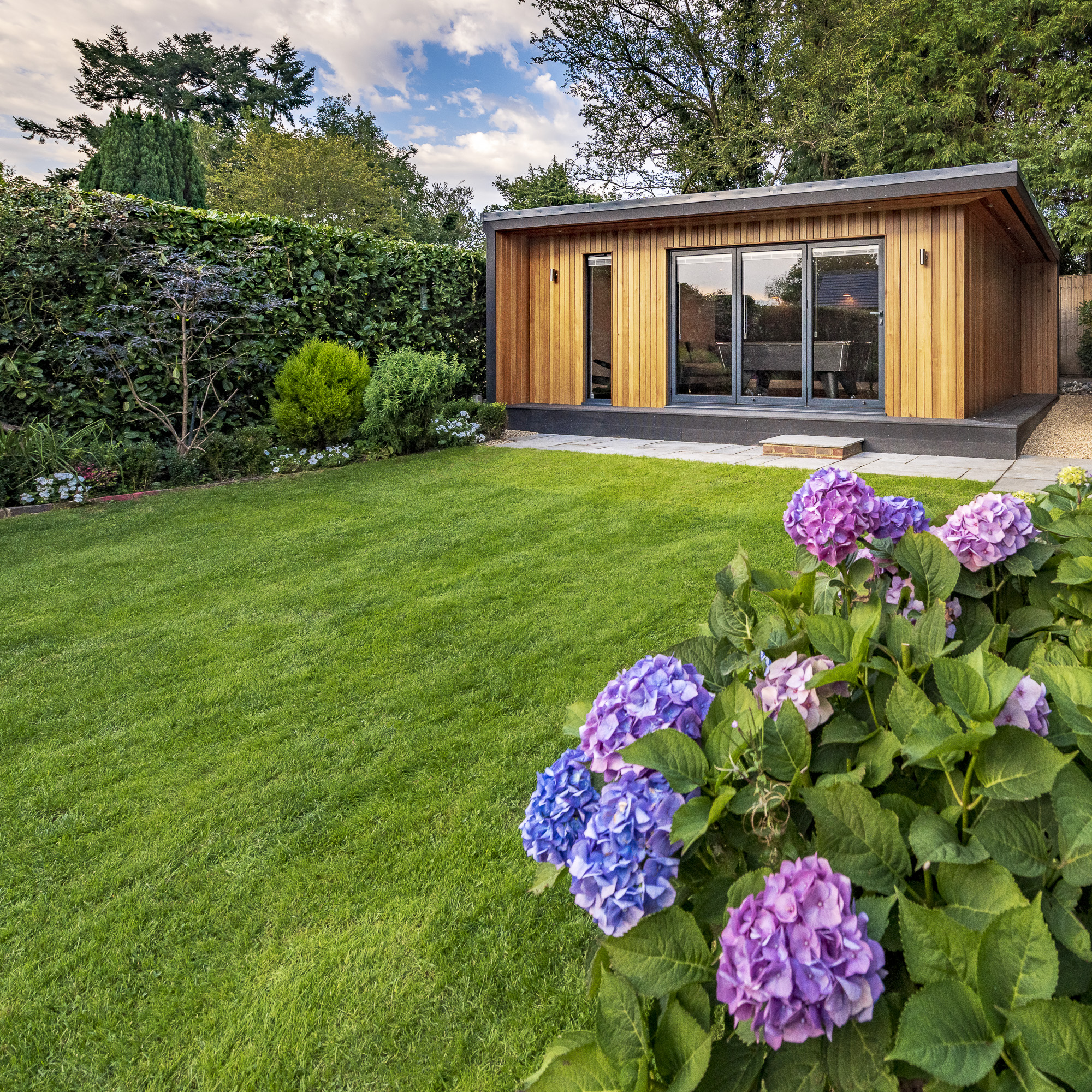 man cave garden studio with billiards table and bar in horsham