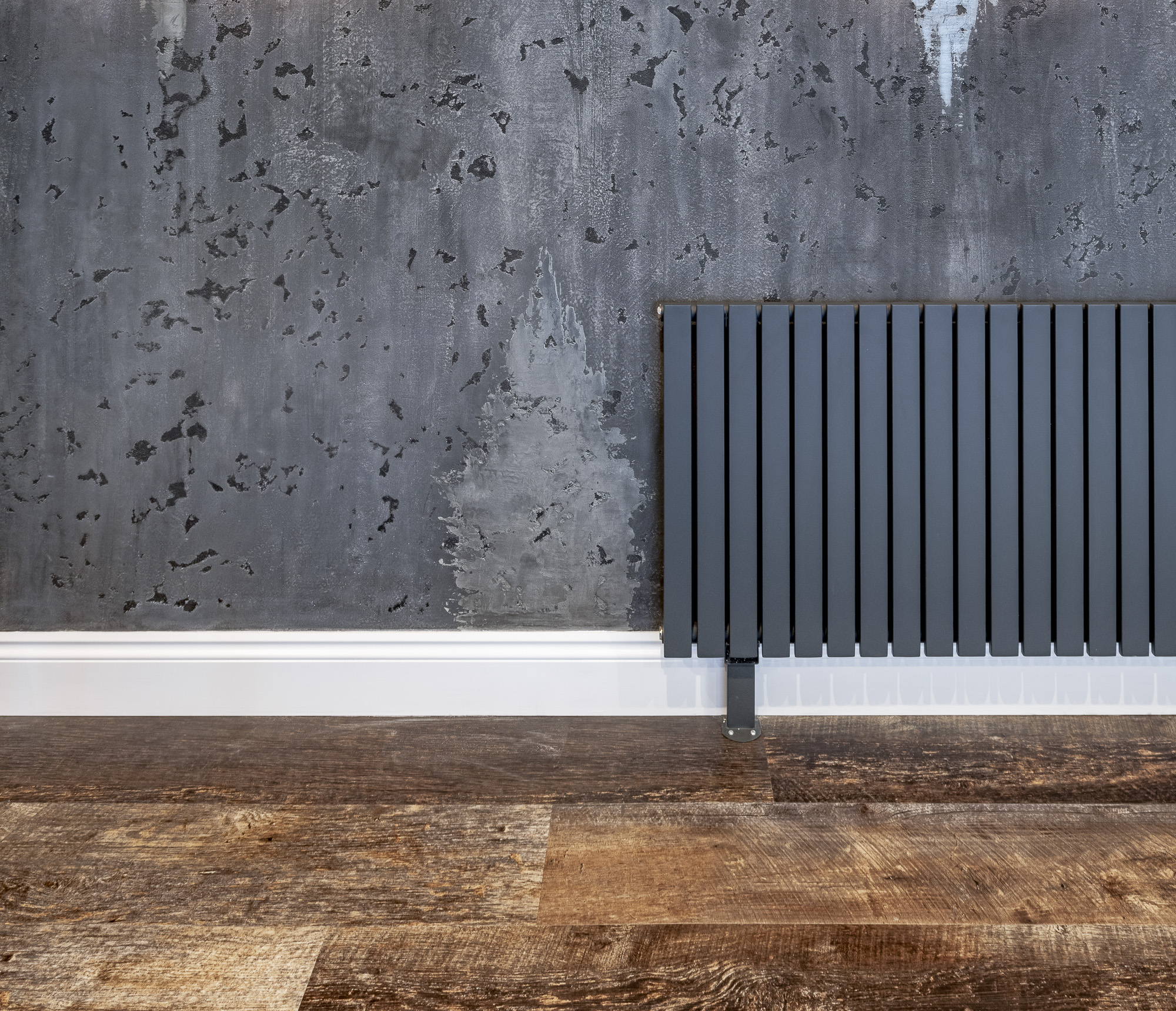 anthracite radiator against venetian plaster wall in man cave garden studio horsham