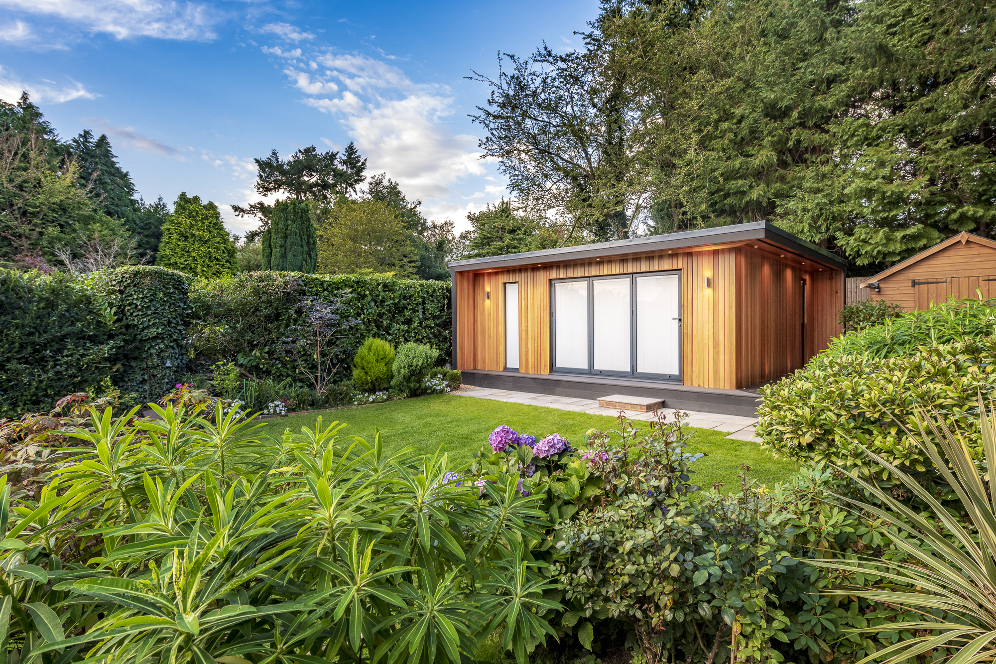 man cave garden studio with billiards table and bar in horsham