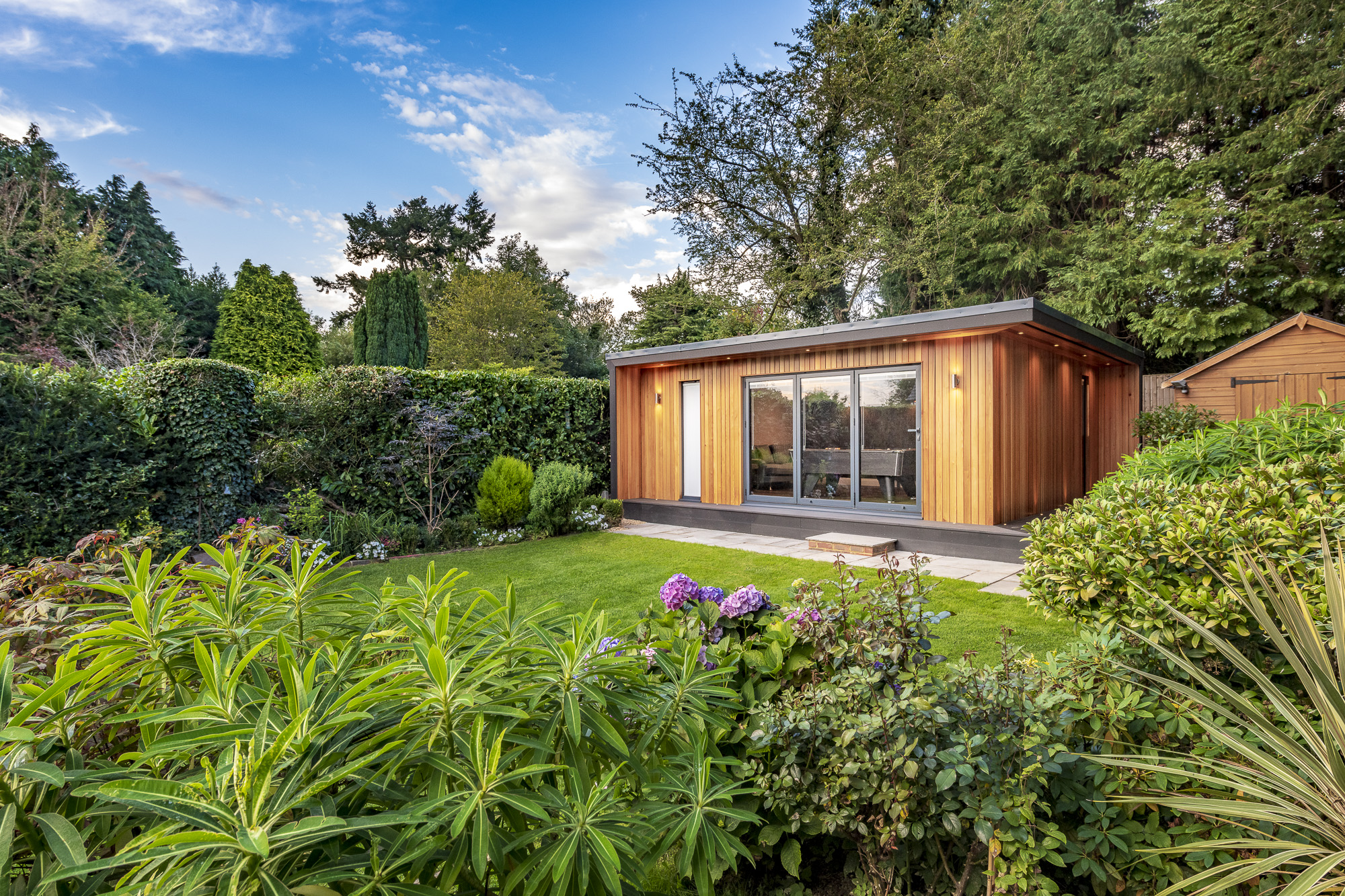man cave garden studio with billiards table and bar in horsham