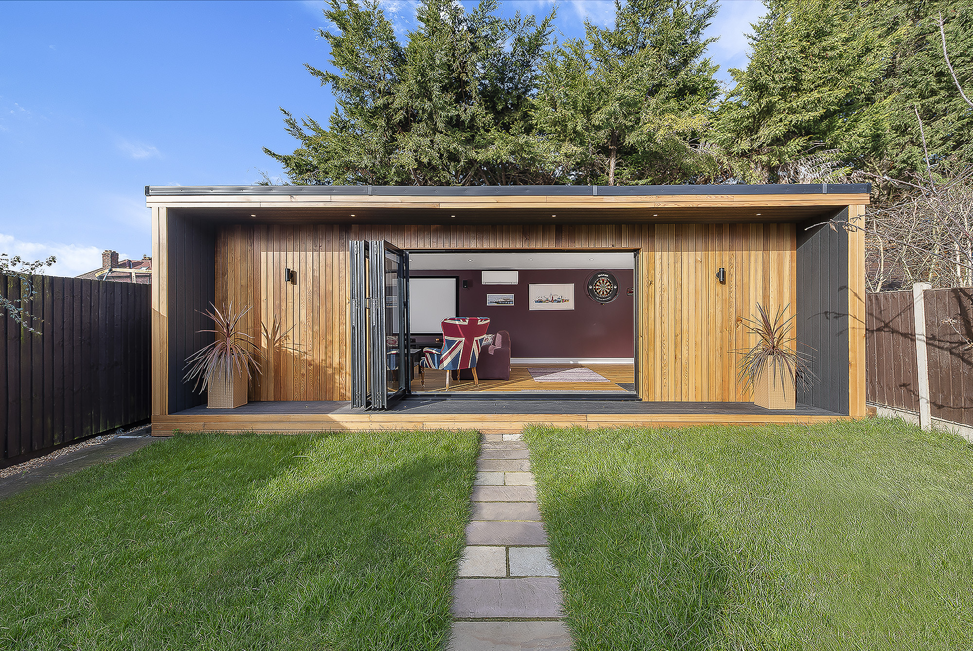 Garden studio games room and peloton in stoneleigh blinds open and bifold doors open